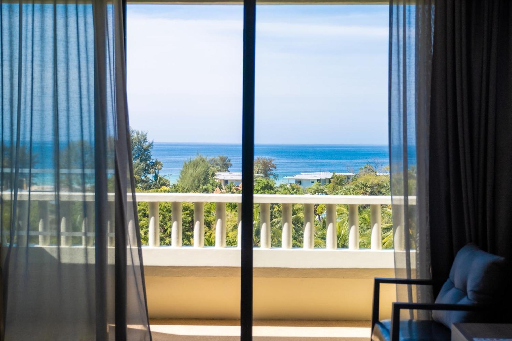 Paradox Resort Phuket Karon Esterno foto A view of the ocean from a room at the hotel